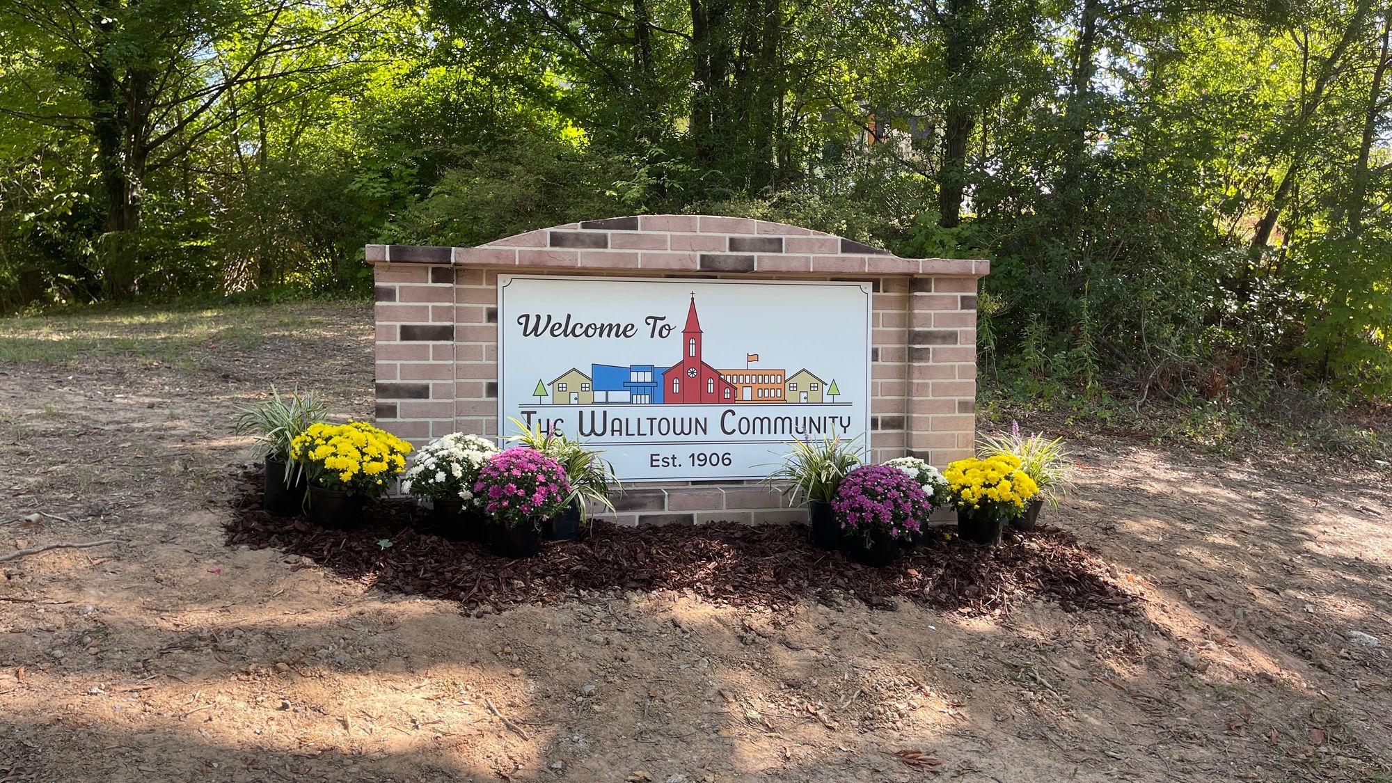 The Walltown community neighborhood sign located at the Walltown Recreational Center on W. Club Blvd.